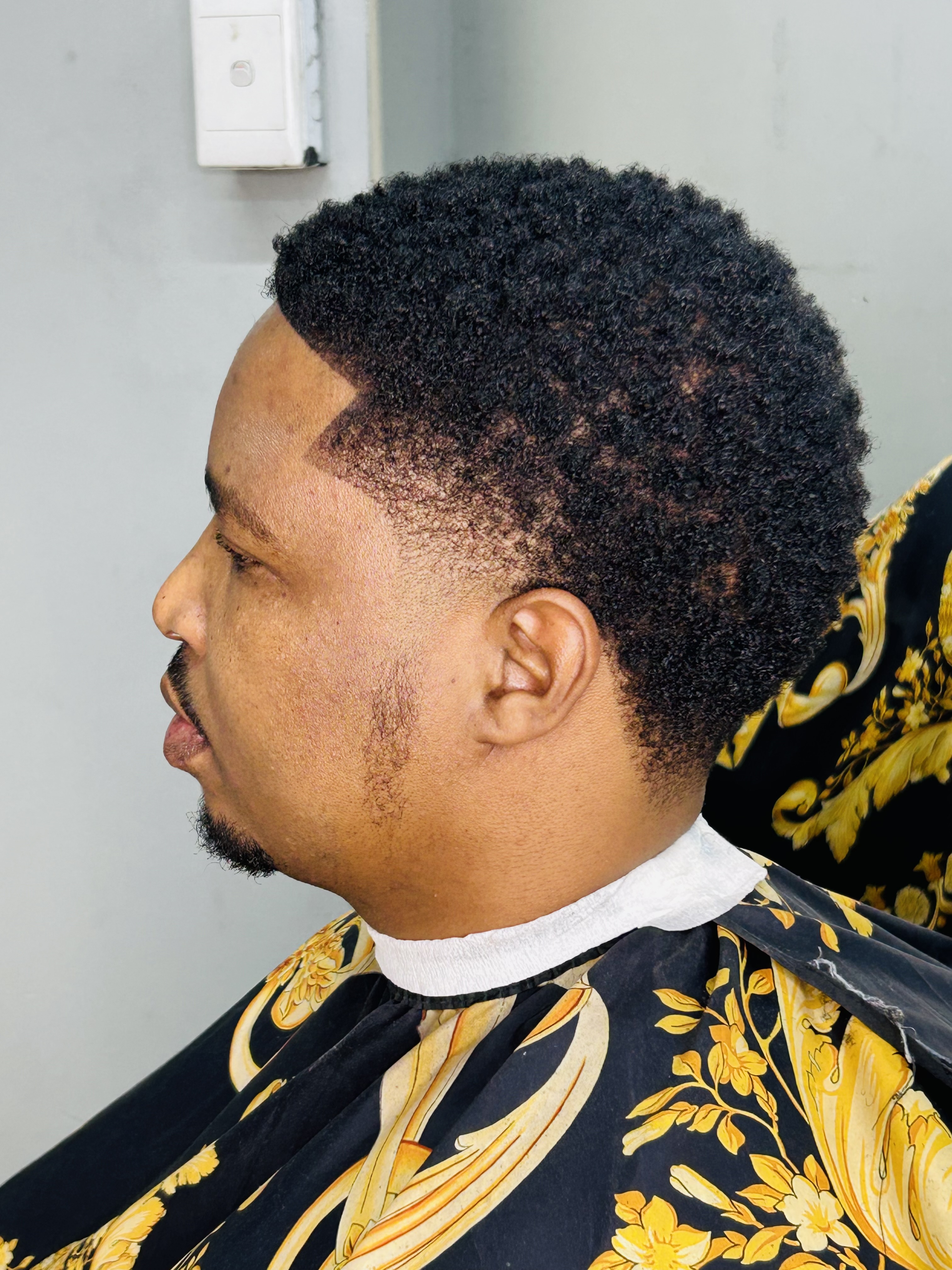 Taper Fade offered by Joe man Joe The Barber 