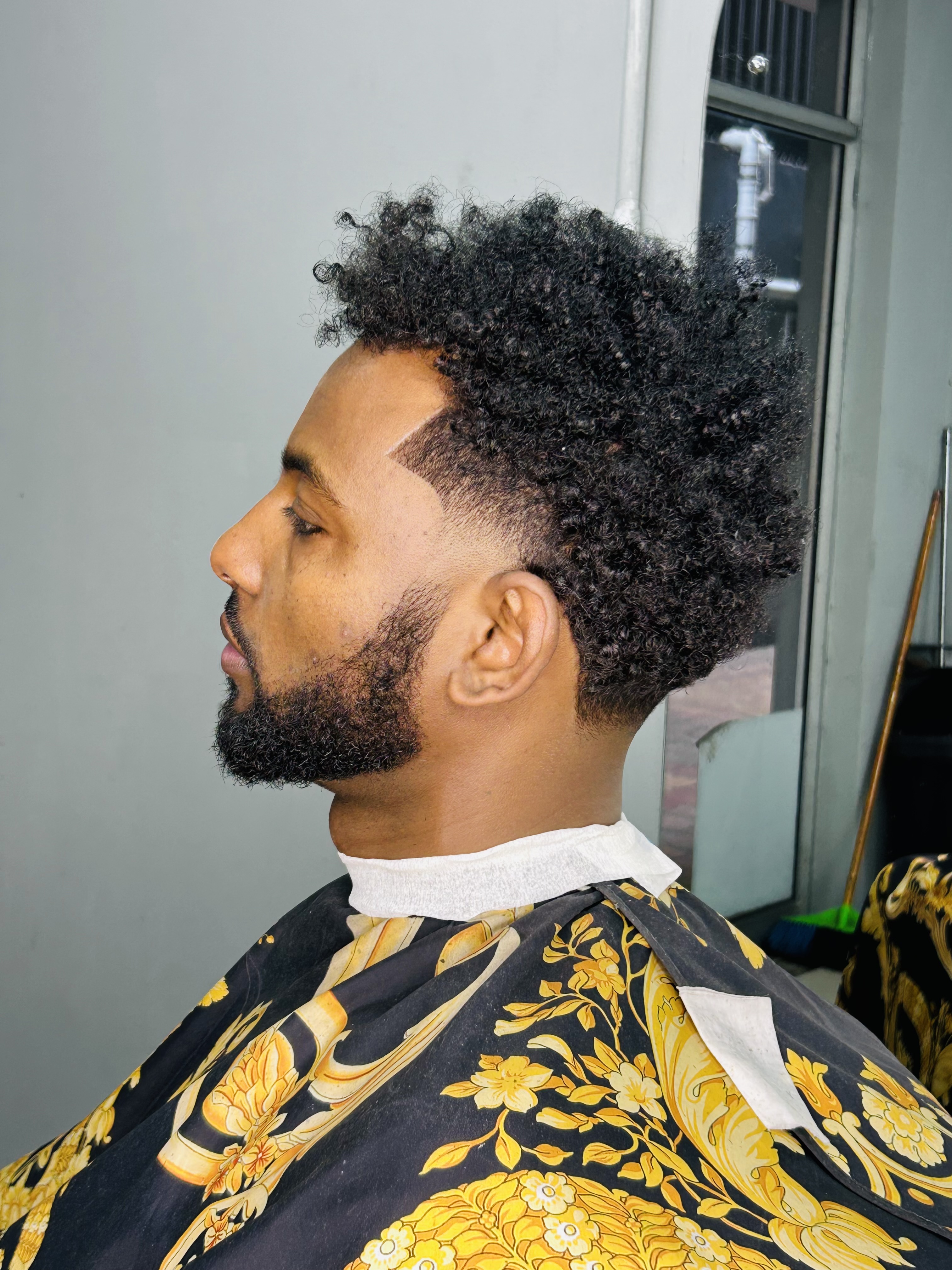 Mid Fade offered by Joe man Joe The Barber 